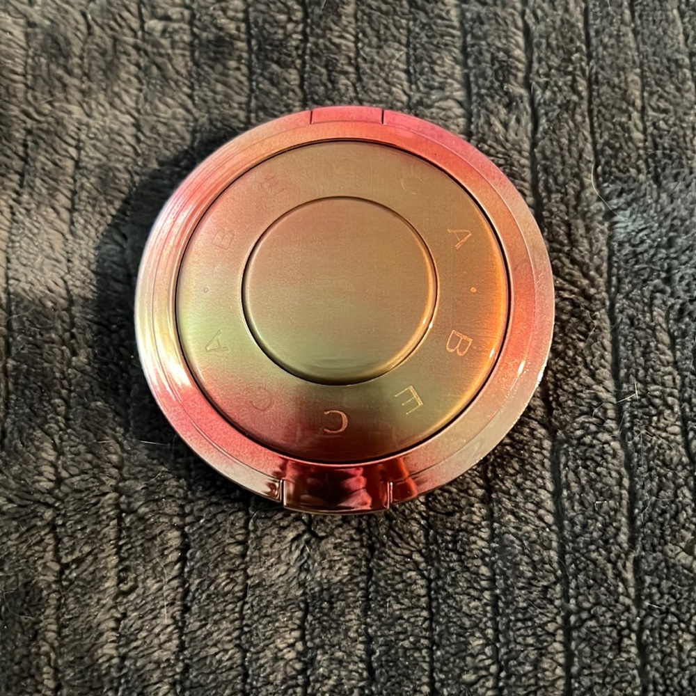 Brand NEW full sized Becca highlighter/blush topper
